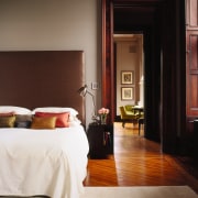 A view of the dining room and master bed, bed frame, bedroom, door, floor, flooring, furniture, hardwood, home, interior design, room, suite, window, wood, black, brown