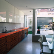 A view of a kitchen, polished concrete floor, architecture, countertop, interior design, kitchen, room, gray