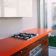 A view of a kitchen, wooden cabinetry, polished cabinetry, countertop, floor, flooring, interior design, kitchen, white