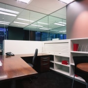 A view of various peices of office furniture. ceiling, furniture, interior design, office, product design, black, white