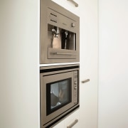 A view of a kitchen area, white cabinetry, furniture, home appliance, kitchen appliance, major appliance, product design, white