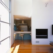 The view from the living area through to architecture, ceiling, daylighting, floor, flooring, hardwood, house, interior design, laminate flooring, living room, loft, room, wall, wood, wood flooring, white