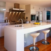 Interior view of kitchen and breakfast bar. - cabinetry, countertop, cuisine classique, floor, hardwood, interior design, kitchen, real estate, room, brown