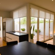 A view of the kitchen and dining areas, architecture, ceiling, interior design, real estate, room, window, brown