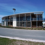 An exterior view of the retirement village. - architecture, building, commercial building, corporate headquarters, headquarters, real estate, sky, structure, blue, gray