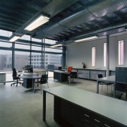 A view of the office furniture. - A daylighting, furniture, interior design, office, gray, black