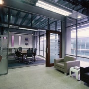 A view of the office furniture. - A daylighting, interior design, office, real estate, gray, black