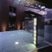 A view of the security systems used through architecture, darkness, daylighting, glass, light, lighting, night, structure, black, blue