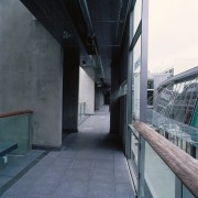 A view of the construction work. - A architecture, building, daylighting, glass, structure, gray, black