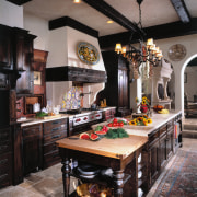 view of this kitchen featuring an electic range countertop, interior design, kitchen, room, table, black, gray