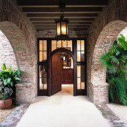 Materials like the brick and terracotta roof tiles arch, architecture, courtyard, door, estate, hacienda, home, real estate, black, white