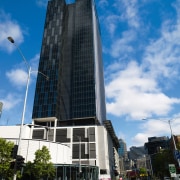 An exterior view of the Freshwater Place building architecture, building, city, commercial building, condominium, corporate headquarters, daytime, downtown, facade, headquarters, landmark, metropolis, metropolitan area, mixed use, real estate, sky, skyscraper, tower, tower block, urban area, black