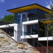 A view of some iron stair rails. - architecture, building, elevation, facade, home, house, property, real estate, residential area, villa, blue