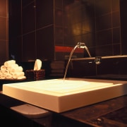 A view of the Kohler products used in design, flooring, furniture, interior design, light, lighting, product design, table, wood, black