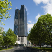 An exterior view of the Freshwater building. - architecture, building, city, commercial building, condominium, corporate headquarters, daytime, downtown, headquarters, landmark, metropolis, metropolitan area, mixed use, neighbourhood, plaza, real estate, sky, skyline, skyscraper, tower, tower block, tree, urban area, brown