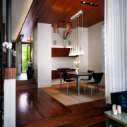 Interior view of the open doorway which leads architecture, ceiling, floor, flooring, furniture, hardwood, house, interior design, living room, room, table, wood, wood flooring, gray, red