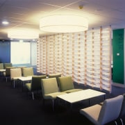 view of this informal office meeting area where architecture, ceiling, conference hall, daylighting, furniture, interior design, lighting, office, table, wall, black