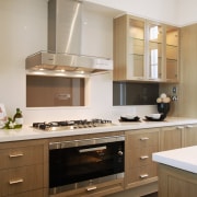 Kitchen with veneer cabinetry, large oven and cooktop, cabinetry, countertop, cuisine classique, interior design, kitchen, room, gray, brown