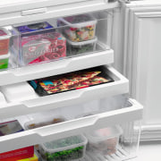 Examples of the new Fisher &amp; Paykel technology frozen food, home appliance, kitchen appliance, major appliance, plastic, product, refrigerator, shelf, shelving, white
