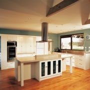 Examples of kitchens designed by Genesis, who also cabinetry, countertop, cuisine classique, floor, flooring, hardwood, interior design, kitchen, real estate, room, wood flooring, brown, orange