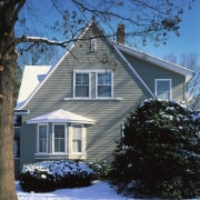 hardiplank siding in the colour monterey taupe was architecture, building, cottage, estate, facade, farmhouse, freezing, home, house, neighbourhood, property, real estate, residential area, roof, siding, sky, snow, suburb, tree, window, winter, black, blue