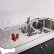 Closeup of kitchen sink with drainer and double bathroom sink, hardware, plumbing fixture, product design, sink, tap, white, gray