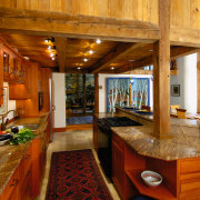 view of this kitchen that sits under the cabinetry, countertop, estate, hardwood, home, interior design, kitchen, real estate, room, wood, brown