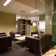 A view of some office furniture. - A ceiling, interior design, lobby, office, brown, black