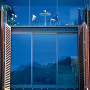 Large window with aluminium joinery and timber shutters. blue, glass, sky, window, blue