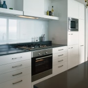 Kitchen with cream cabinetry and stainless steel oven cabinetry, countertop, cuisine classique, home appliance, interior design, kitchen, kitchen appliance, kitchen stove, room, white, gray