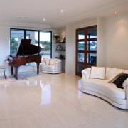 Open plan home with cream walls, polished floor estate, floor, flooring, hardwood, home, interior design, living room, property, real estate, room, window, wood flooring, gray