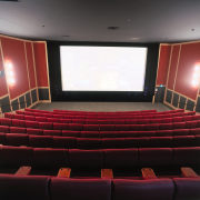 Movie cinema with red seating and red wall auditorium, movie theater, performing arts center, theatre, black