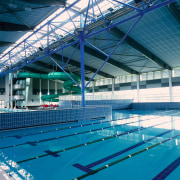 View of pool complex with ceiling panels and blue, leisure, leisure centre, resort town, sport venue, structure, swimming pool, water, teal