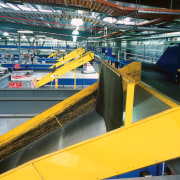 View of airport baggage handling equipment. - View yellow, yellow