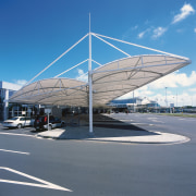 View of large sail-like canopy providing shelter outside architecture, fixed link, sky, structure, gray, teal