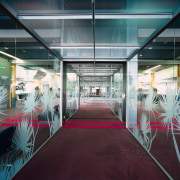 A glazed corridor at the airport terminal with architecture, ceiling, daylighting, glass, interior design, structure, black, gray