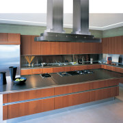 View of modern kitchen with brown wood cabinetry, cabinetry, countertop, interior design, kitchen, gray, brown