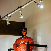 Retail shop display with spotlights on a rail. ceiling, lighting, brown