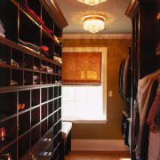 A view of the closet. - A view cabinetry, ceiling, closet, flooring, hardwood, interior design, lighting, room, wood, black, brown