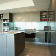 View of this kitchen featuring Miele five burner cabinetry, countertop, cuisine classique, floor, interior design, kitchen, room, brown