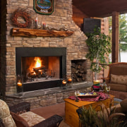 Lounge room with large stone fireplace, open fire fireplace, hearth, home, interior design, living room, wood burning stove, brown, red