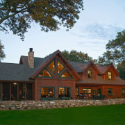 Exterior view of rustic style home. - Exterior cottage, estate, facade, farmhouse, home, house, log cabin, mansion, property, real estate, roof, tree, brown