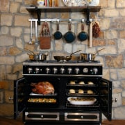 Traditional style range with two convection ovens and chest of drawers, furniture, hearth, kitchen appliance, kitchen stove, masonry oven, table, brown