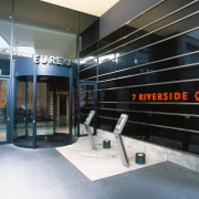 view of eureka tower that features  composite architecture, floor, glass, interior design, lobby, real estate, black, white