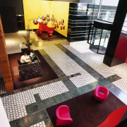 view of the lobby/entrance area of eureka tower architecture, floor, flooring, furniture, interior design, living room, room, table, black, white