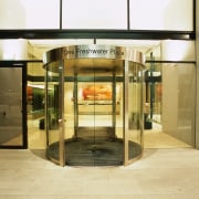 view of the entrance to freshwater place featuring door, brown, orange, yellow