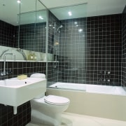 A view of some stone surfaces by SMG architecture, bathroom, floor, glass, interior design, property, room, tile, wall, gray, black