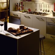 A view of some Fisher &amp; Paykel appliances. countertop, furniture, interior design, kitchen, room, table, brown, black