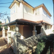 A view of a cottage renovated by Cape building, cottage, estate, facade, home, house, property, real estate, residential area, roof, siding, sky, villa, black