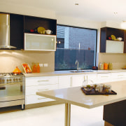 A view of a NSD home. - A cabinetry, countertop, cuisine classique, interior design, kitchen, room, white